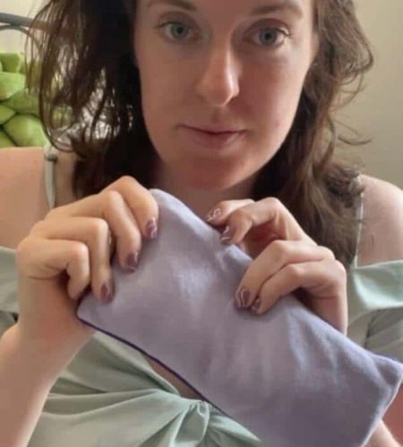 Close-up of a lavender eye pillow by Mumu Wraps showing soft textured fabric